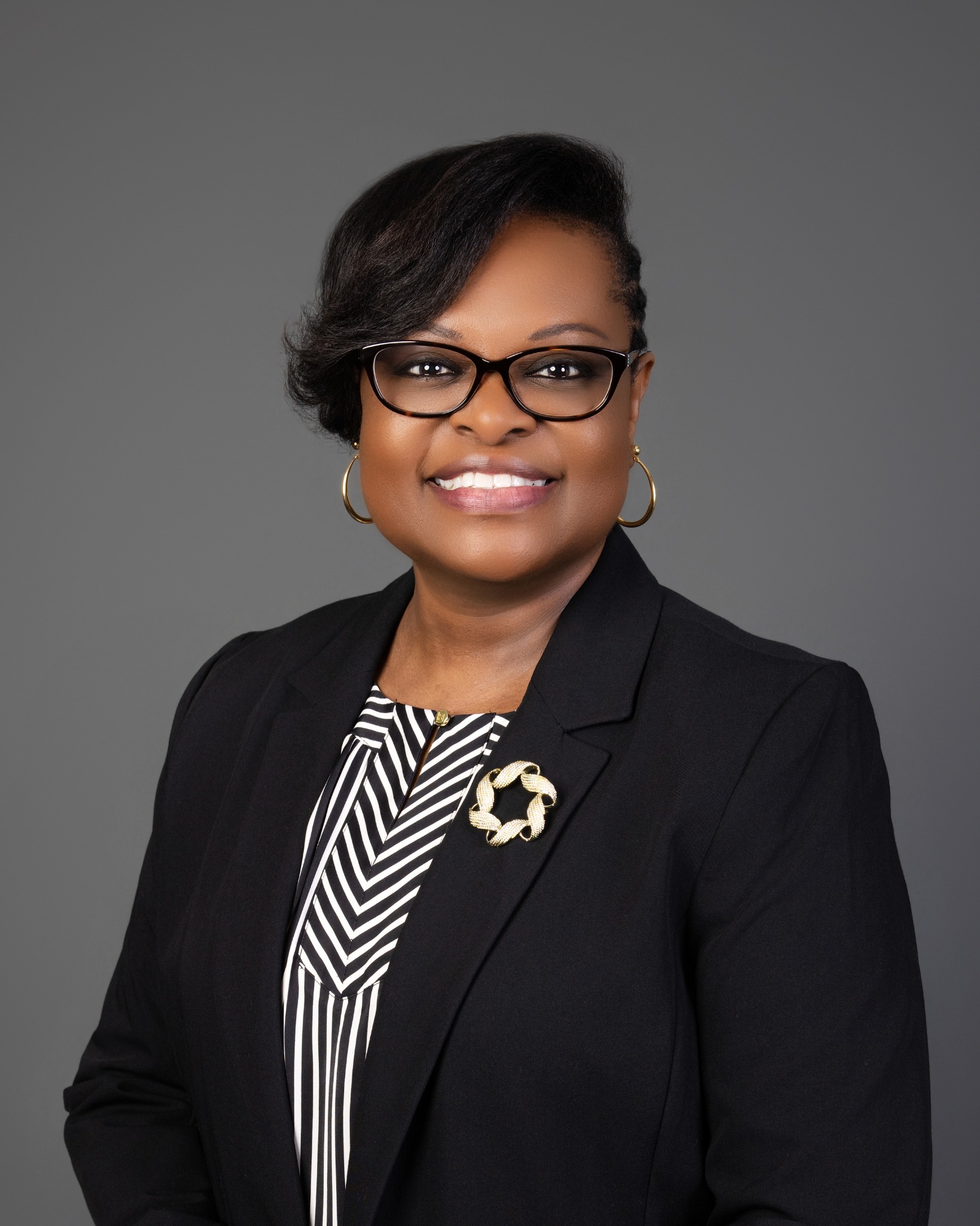 Portrait of Jennifer Priest, founder of GYHIO.